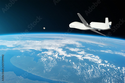 Unmanned aircraft flying in the upper atmosphere, the study of the gas shells of the planet Earth, moonrise on the horizon. Elements of this image furnished by NASA.