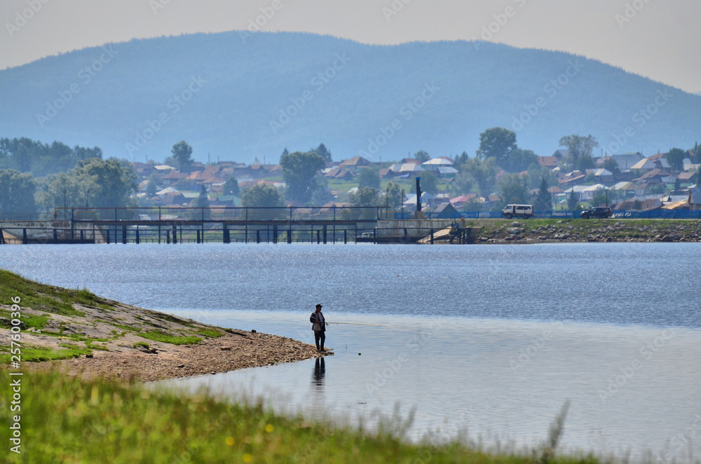 The pond located near the village of Tirlyan (southern Urals) always attracts fishermen.
