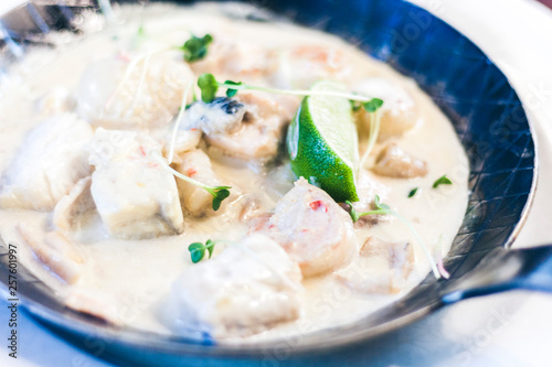 Seafood cream saute with lime in pan in restaurant.