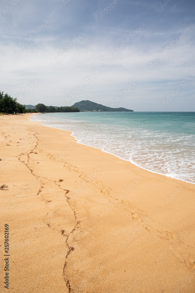 Empty tropical beach background. Horizon with sky and white sand