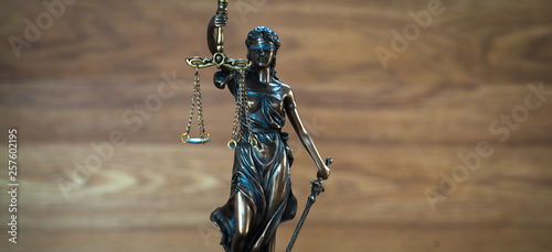 Law and Justice concept on wooden background