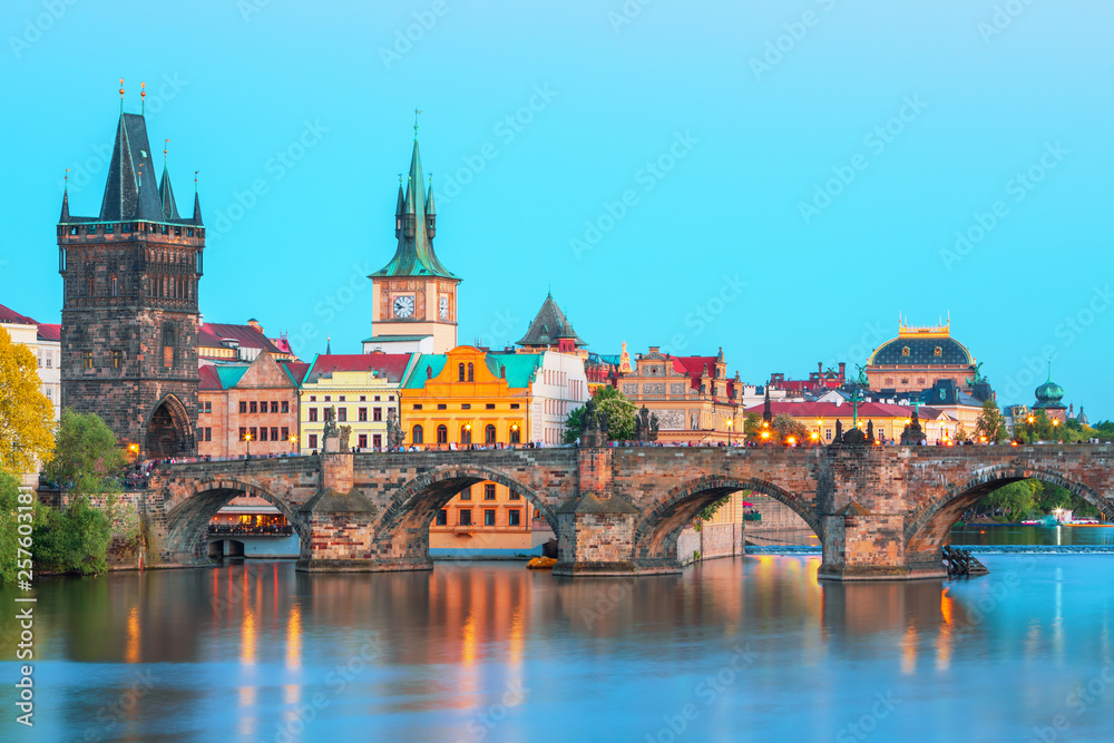 Scenic view Charles bridge and historical center of Prague, buildings and landmarks of old town at sunset, Prague, Czech Republic