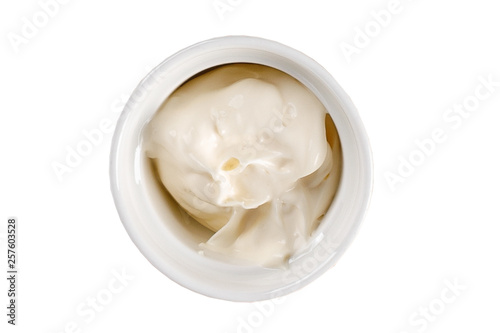 Mayonnaise sauce in bowl isolated on white background.
