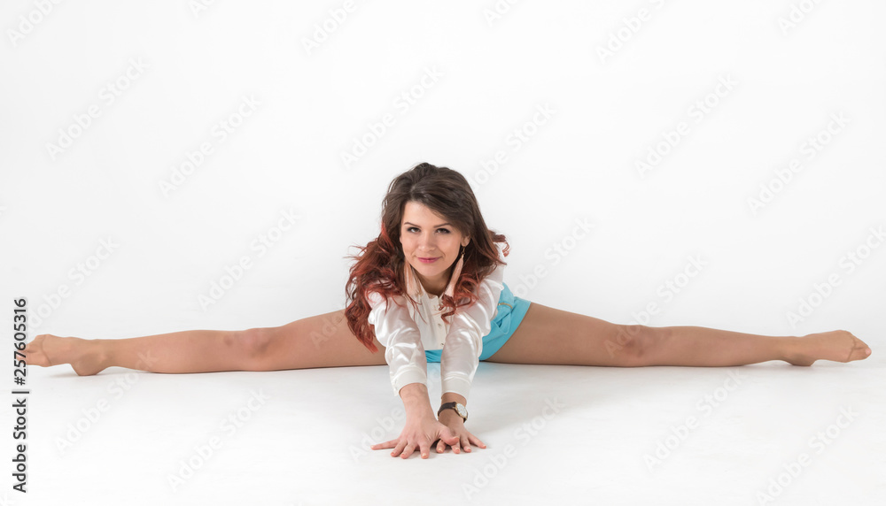 Portrait of a young beautiful woman in studio. Portrait of a young beautiful woman in studio.