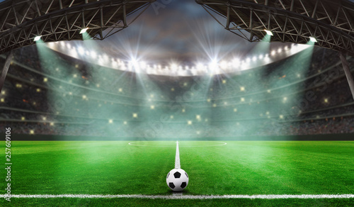 soccer game starts - Soccer ball in stadium photo
