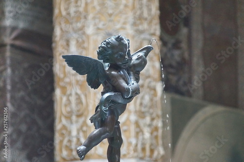 Fountain of putto with dolphin by Verrocchio, Palazzo Vecchio, Florence, Italy photo