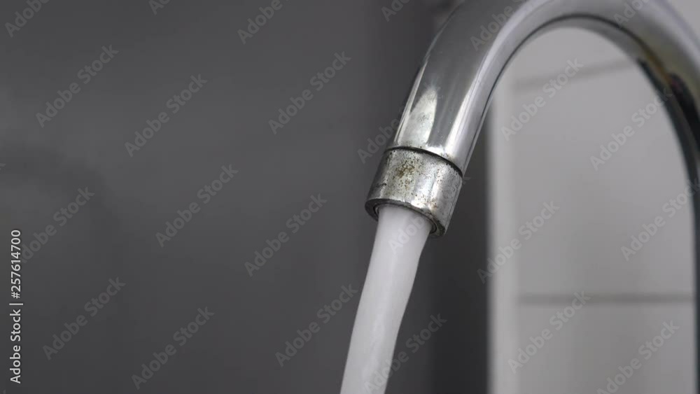 running water from sink tap, close up shot, cleaning concept running water from sink tap, close up shot, cleaning concept