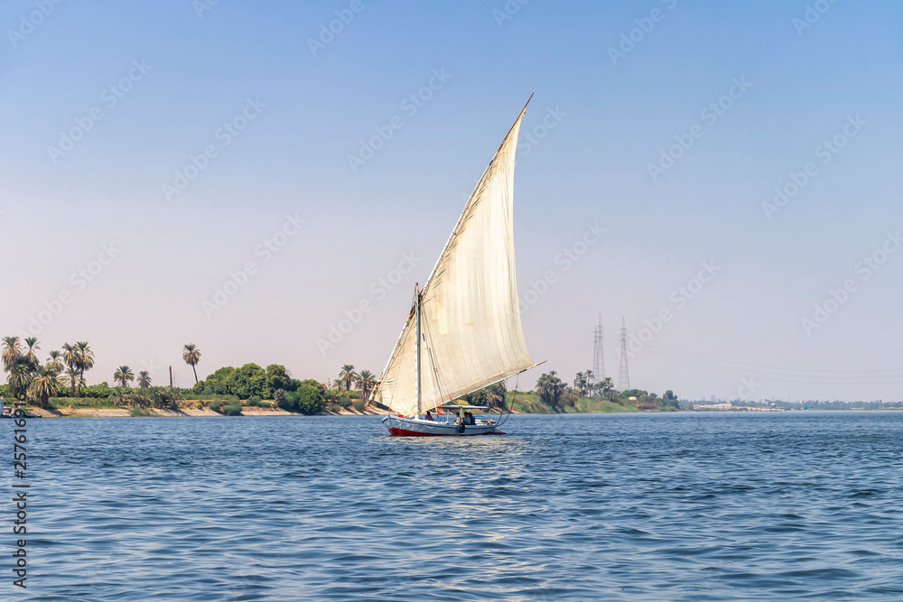 Fototapeta premium Faluca boat sailing in Nile river