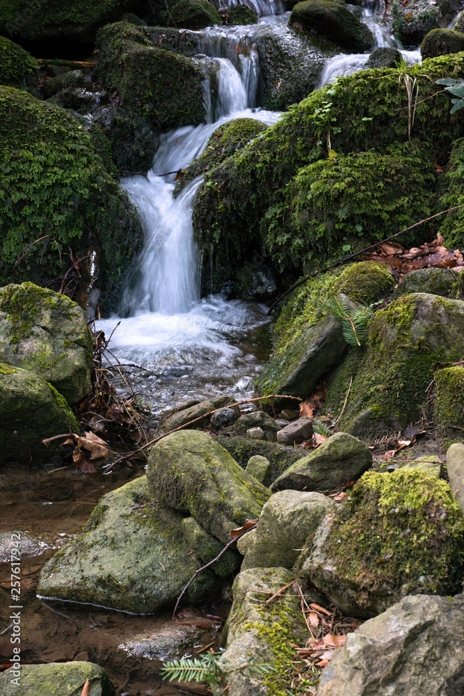mountain waterfall among big stones mountain waterfall among big stones