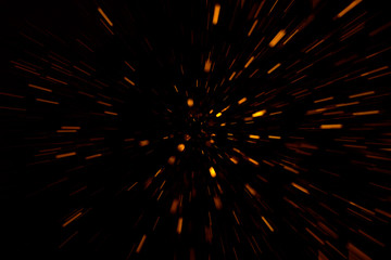 Shiny particles rays moving burst on black background