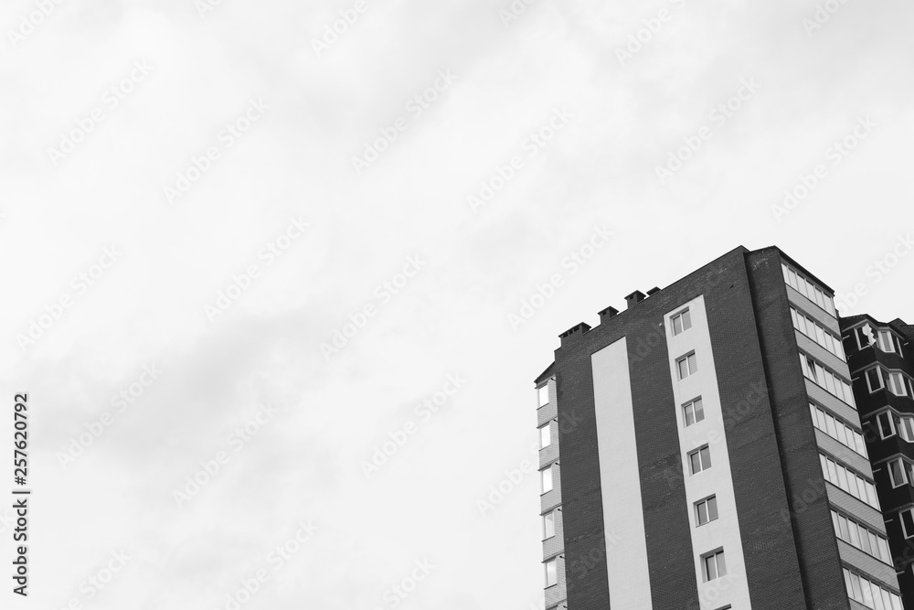 Abstract fragment of contemporary architecture. Residential modern building, dramatic black and white, copy space Abstract fragment of contemporary architecture. Residential modern building, dramatic black and white, copy space