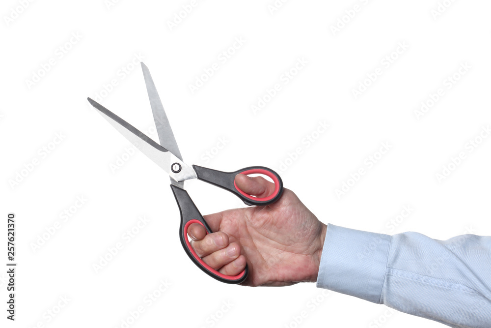 man' hand holding a pair of isolated on white background with copy space and clipping path included man' hand holding a pair of isolated on white background with copy space and clipping path included