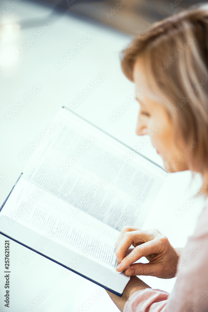 Close Up of a Reading Elderly Woman of European Appearance. Close Up of a Reading Elderly Woman of European Appearance.