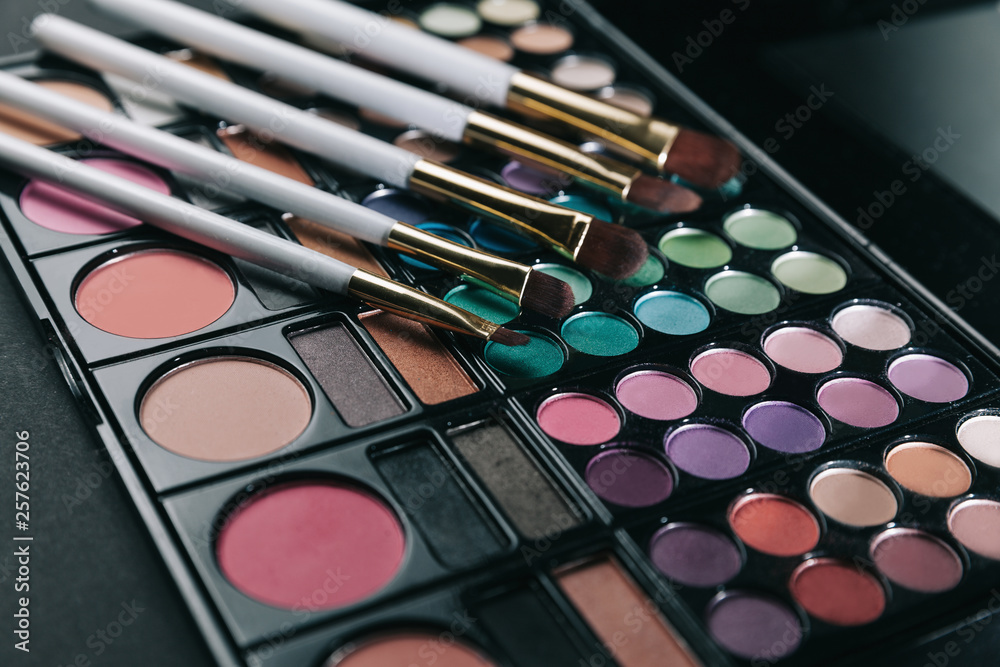 close up. brushes and eye shadow. isolated on black close up. brushes and eye shadow. isolated on black