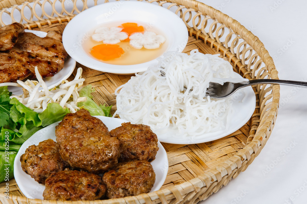 Traditional oriental cuisine of  Vietnam. Bun cha rice noodles with meat steak and bean sprouts