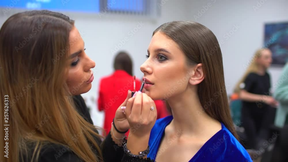 fashion show, visagist working, making professional make up, backstage. beautiful face of female girl model. Make up artist applying stylish makeup to young woman, visage for beauty contest 4 K fashion show, visagist working, making professional make up, backstage. beautiful face of female girl model. Make up artist applying stylish makeup to young woman, visage for beauty contest 4 K
