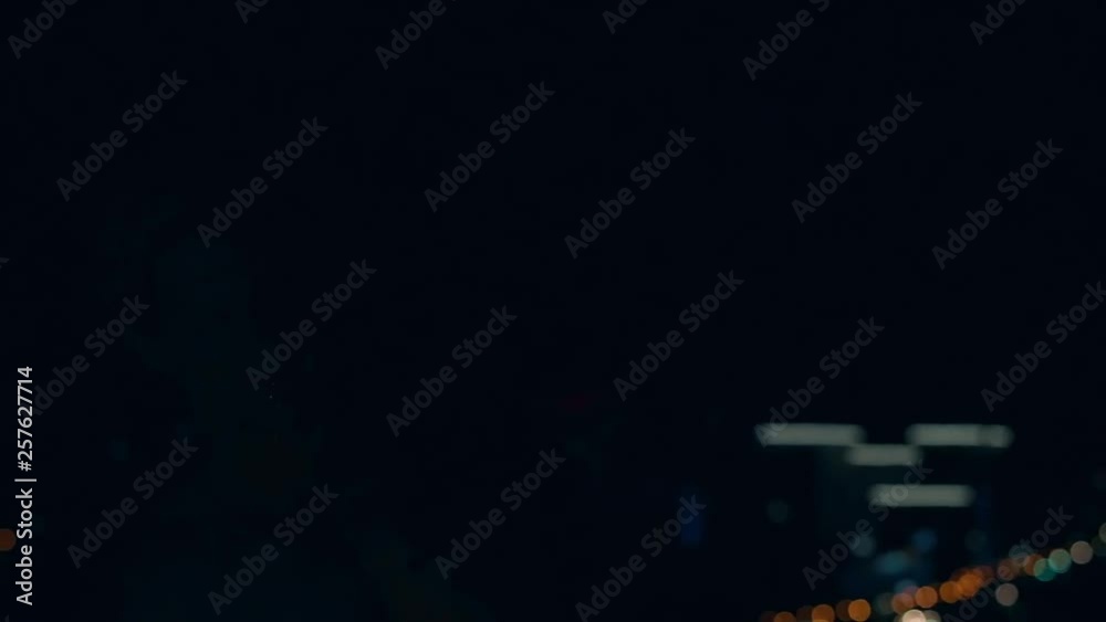 Young blond male breathes out large stream of fire making fireball. Slow motion, close-up Young blond male breathes out large stream of fire making fireball. Slow motion, close-up