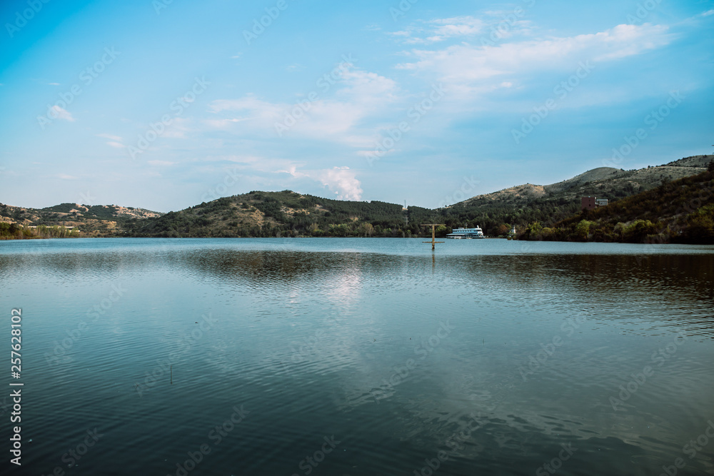 blue lake with cloudy sky, nature series blue lake with cloudy sky, nature series