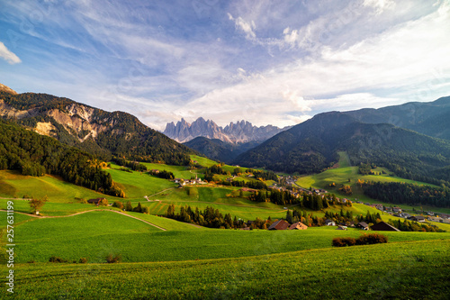Santa Maddalena village with magical Dolomites mountains in background, Val di Funes valley, Trentino Alto Adige region, Italy, Europe. Wide view of dramatic Italian Dolomites landscape.