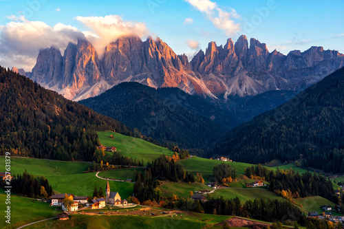 Santa Maddalena village with magical Dolomites mountains in background, Val di Funes valley, Trentino Alto Adige region, Italy, Europe. Sunset view of dramatic Italian Dolomites landscape.