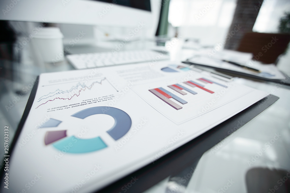 Fototapeta premium closeup.financial report on the table of the businessman