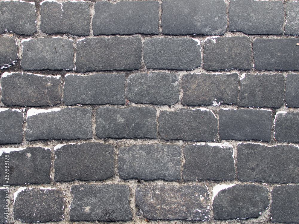 Obraz premium Abstract background from old pavement top down view