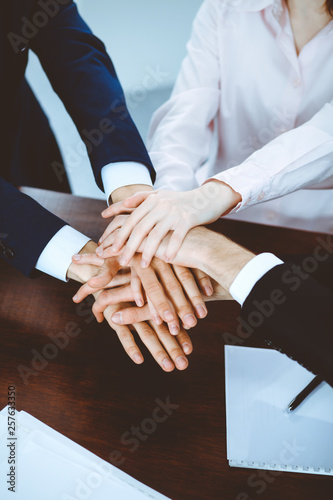 Business people group joining hands. Teamwork or meeting concepts photo