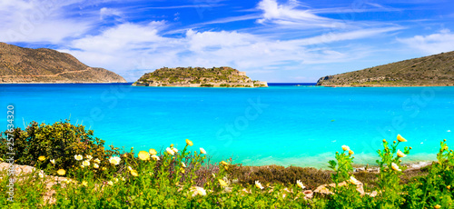 Fototapeta Naklejka Na Ścianę i Meble -  Greece. perfect summer destinations. Crete. View of Spinalonga island from Plaka beach.  Scenic nature and beautiful beach greek scenery