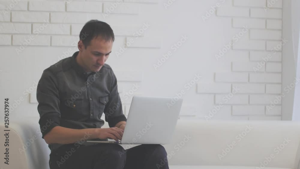 The business man is opening a laptop and working out of the state. 4k The business man is opening a laptop and working out of the state. 4k