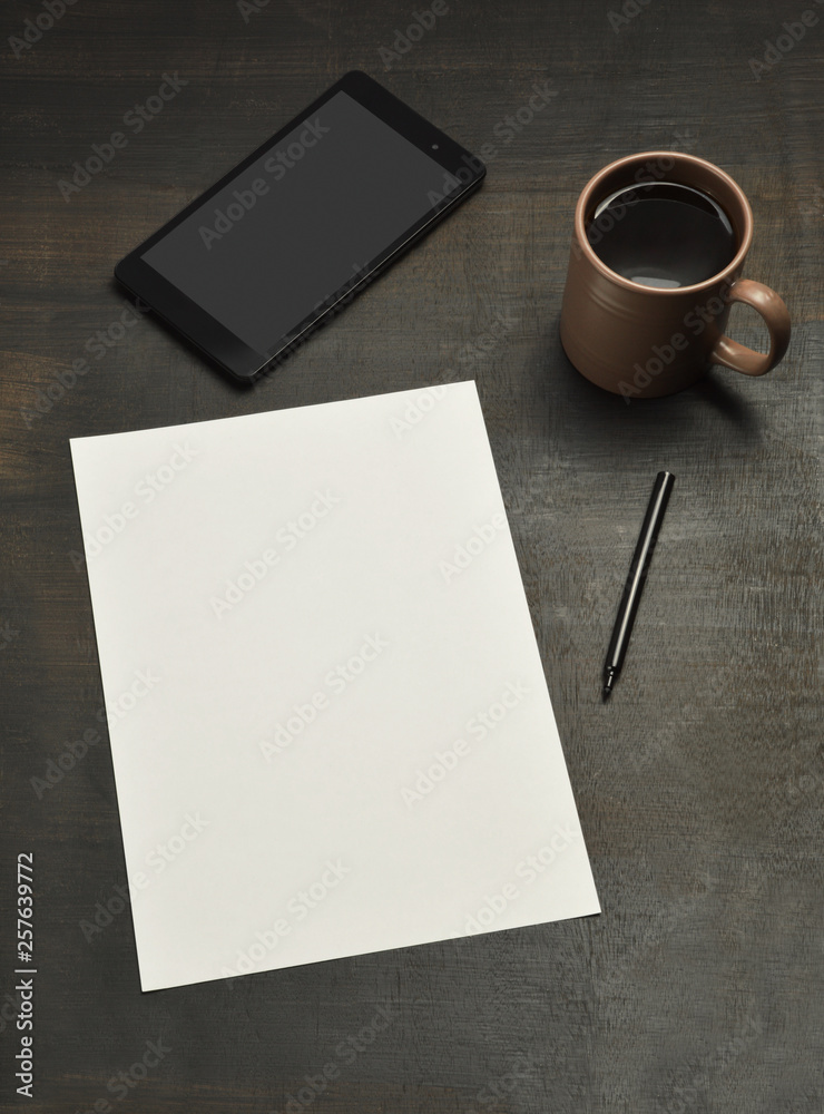 Office desk, digital tablet, empty note paper (screen has clipping path) Office desk, digital tablet, empty note paper (screen has clipping path)