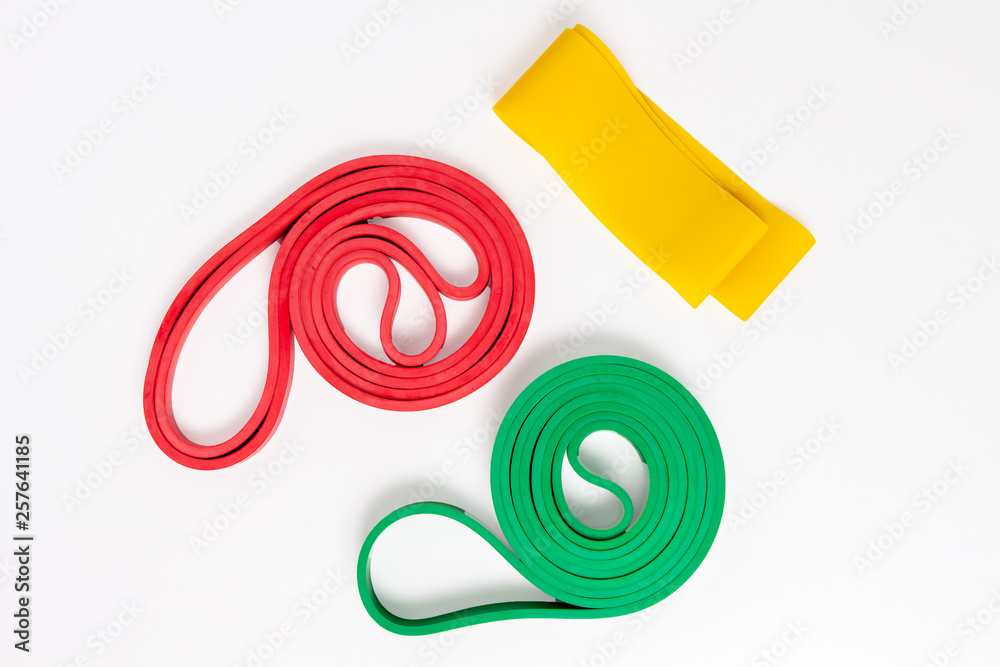 Expander fitness tape for sports training. Rubber tape for fitness classes. Stretch tape