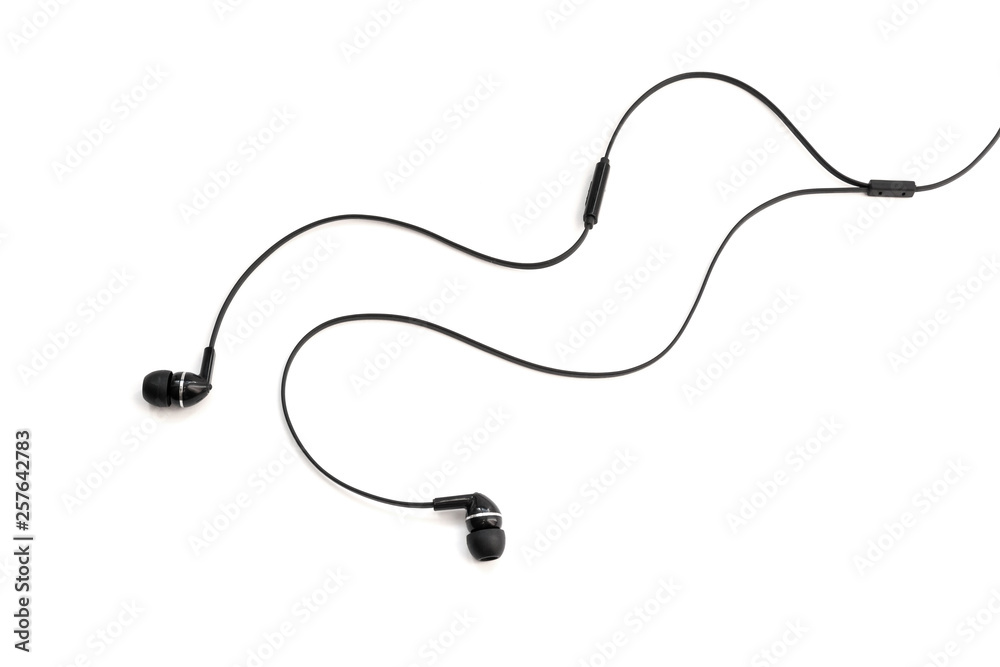 Fototapeta premium Headphones for listening music and sounds on portable devices on a white background. Ear plugs. Earflaps for a mobile phone. Headset from two earpieces. Playing music