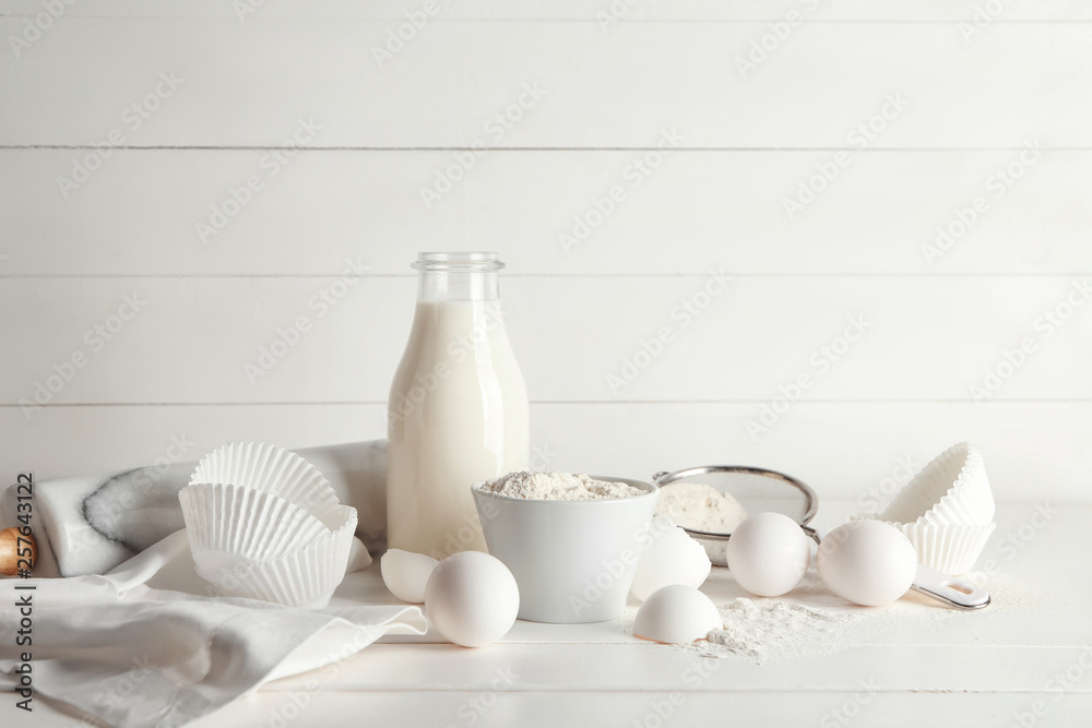 Fresh ingredients for bakery on white table Fresh ingredients for bakery on white table