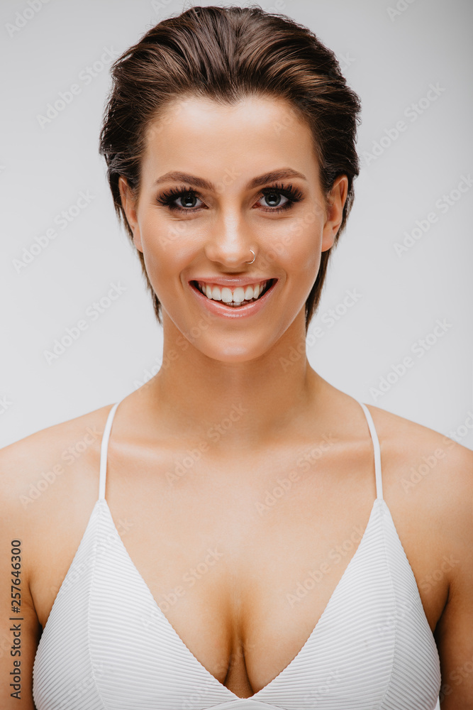 Beautiful Caucasian Brunette Girl on White Backdrop Beautiful Caucasian Brunette Girl on White Backdrop