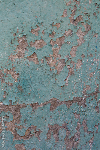 Textural background painted in turquoise color old plaster.