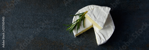 Cheese camembert or brie with fresh rosemary photo