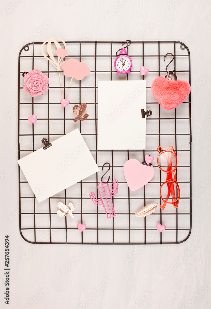 Wire grid board with girl's accessories and cards for inspirational quotes Stock Photo Adobe Stock