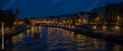 Night view from Seine River in Paris France