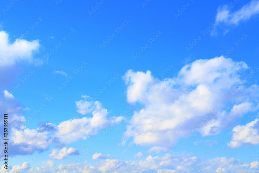 Beautiful blue sky and white cumulus clouds. Background. Landscape. Beautiful blue sky and white cumulus clouds. Background. Landscape.