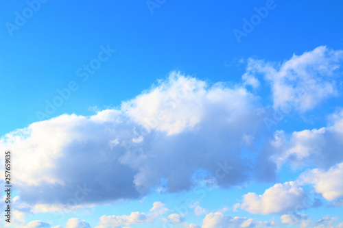 Beautiful blue sky and white cumulus clouds. Background. Landscape.