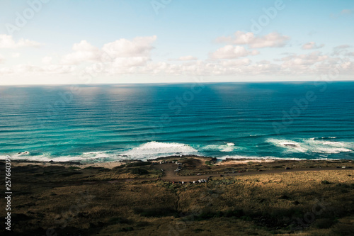 Ocean Waves on Island Coast and Shoreline Landscape Nature Photo