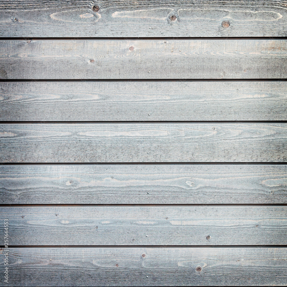 horizontal wooden planks with grey paint on fence horizontal wooden planks with grey paint on fence