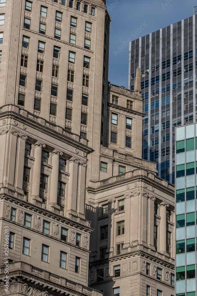 Close-up view of historical and modern skyscrapers in Financial District Lower Manhattan New York City