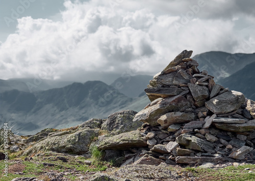 Pile of stones, summit cairn on Whiteless Pike on a sunny day in the English Lake District, UK Fototapete