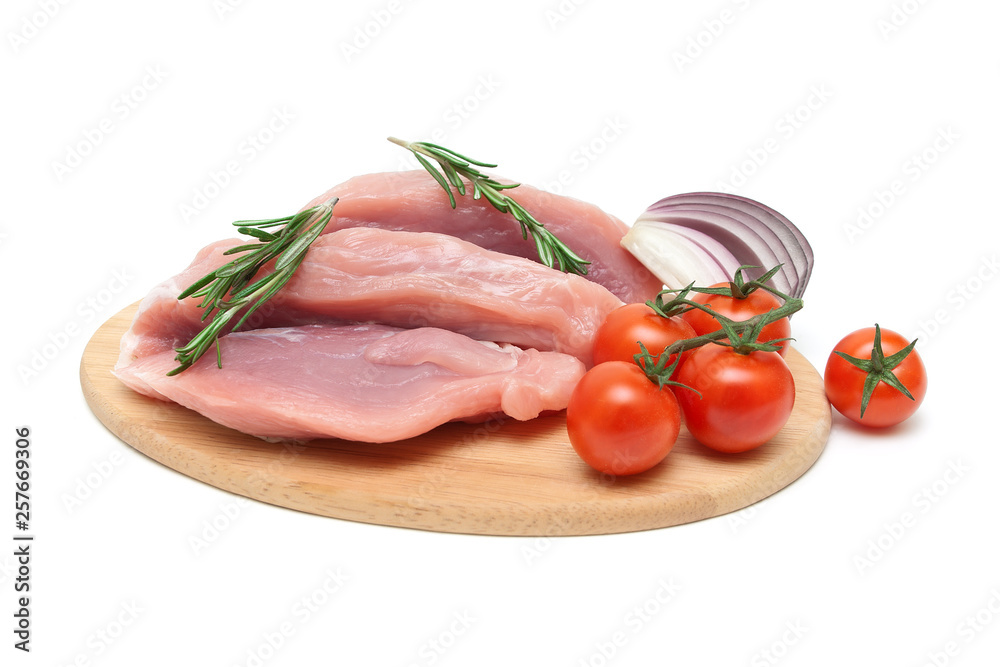 piece of meat, tomato, onion and rosemary on a white background piece of meat, tomato, onion and rosemary on a white background