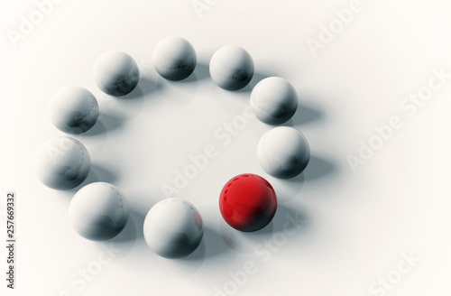 Business concept of white balls with red leader.