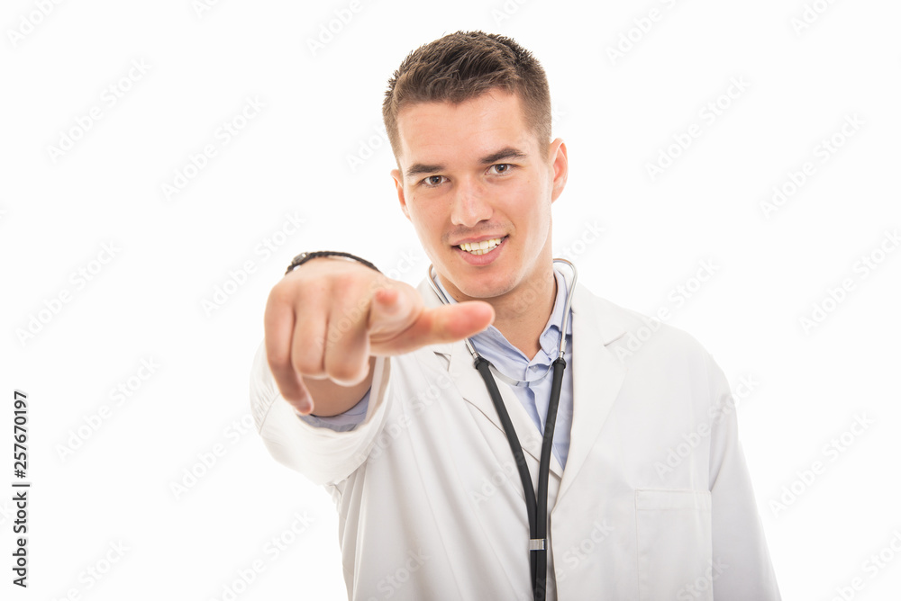 Portrait of young handsome doctor pointing camera Portrait of young handsome doctor pointing camera