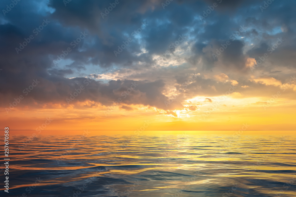 a golden sunset at the ocean