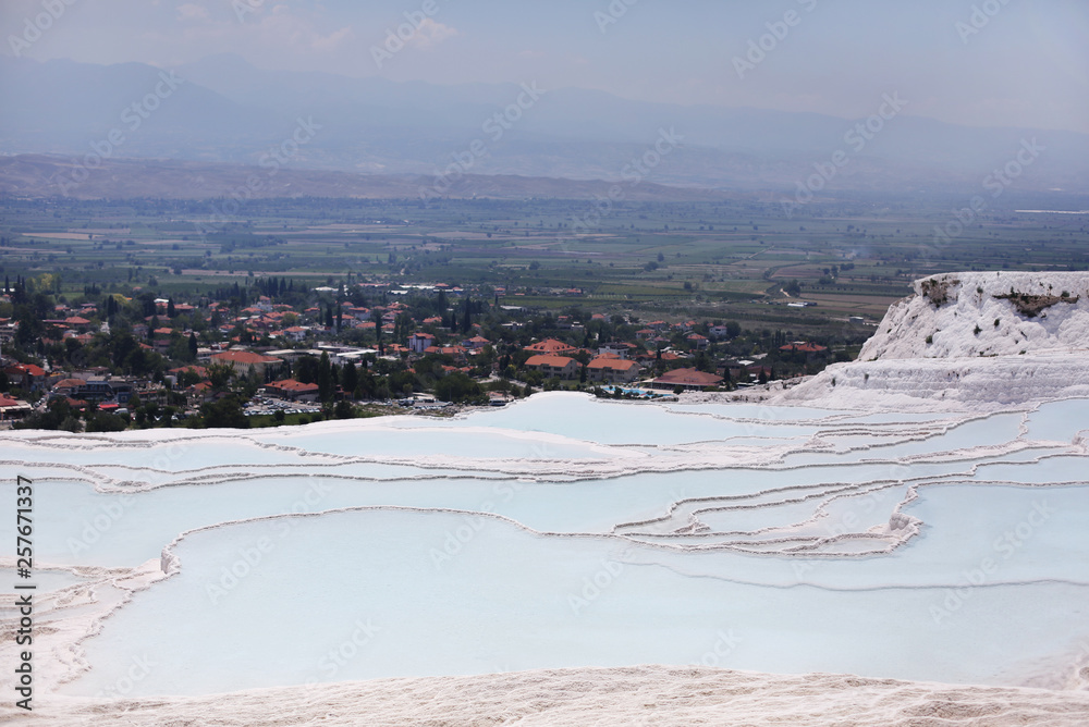 A breathtaking view on Pamukkale natural site of hot springs and travertines (terraces of carbonate minerals)/southwestern Turkey, Denizli Province, River Menderes valley /Unesco world heritage site