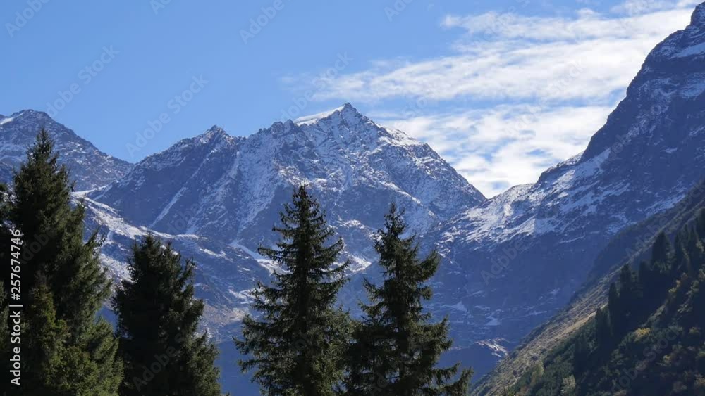 Timelapse – Mountains and Clouds with Plane Timelapse – Mountains and Clouds with Plane